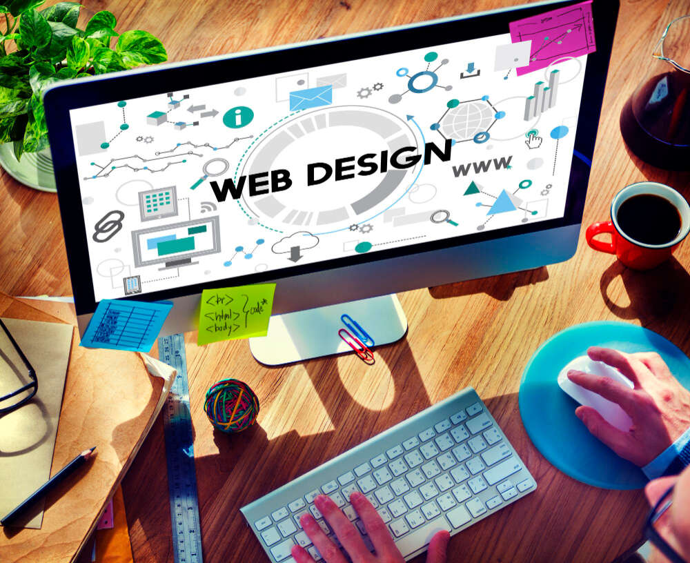 Ashik Mahmud building a modern WordPress website on a laptop – 2025 web design trends.